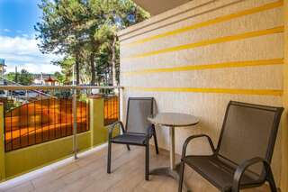 Гостиница Ива Дивноморское Первой категории с двуспальной кроватью или двумя односпальными-4